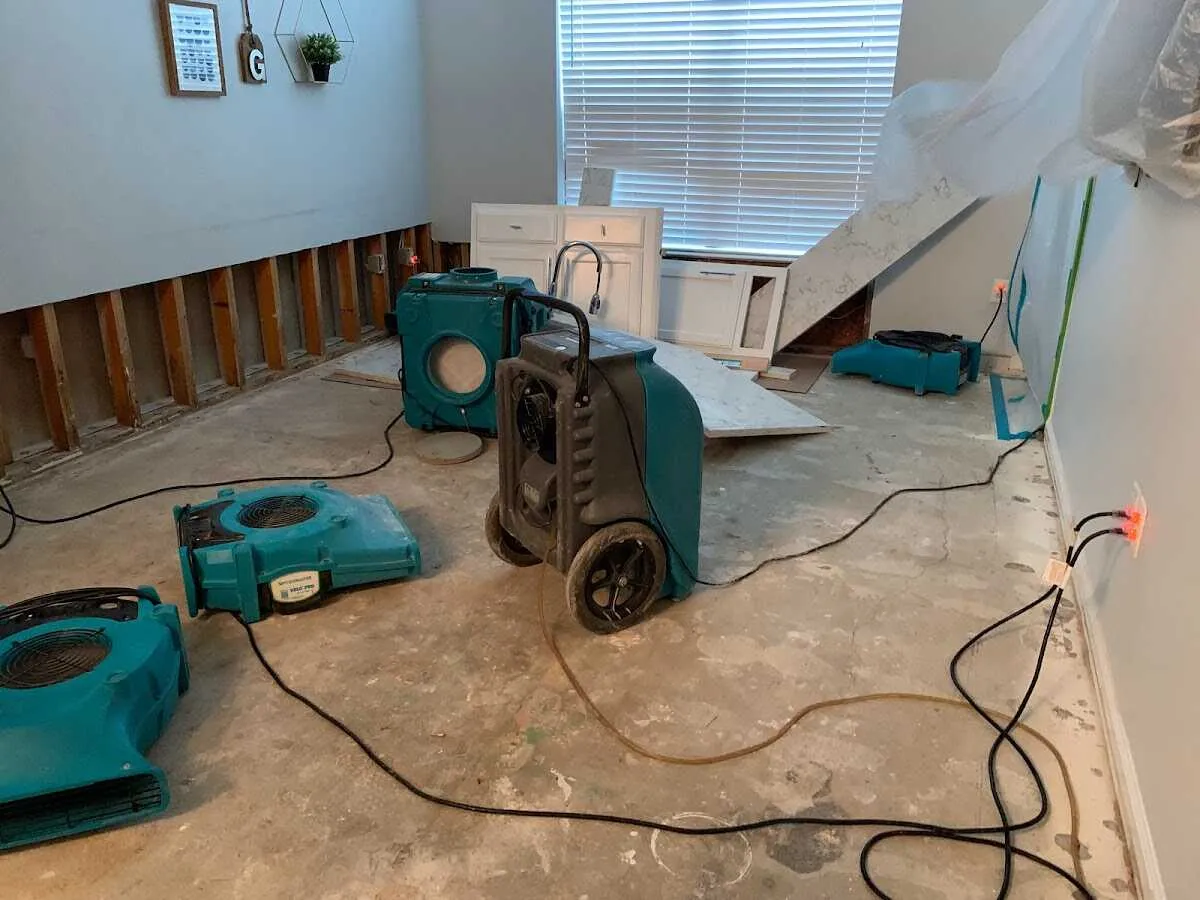 Dehumidifier in flood-cut room for Water Damage Restoration in Redmond